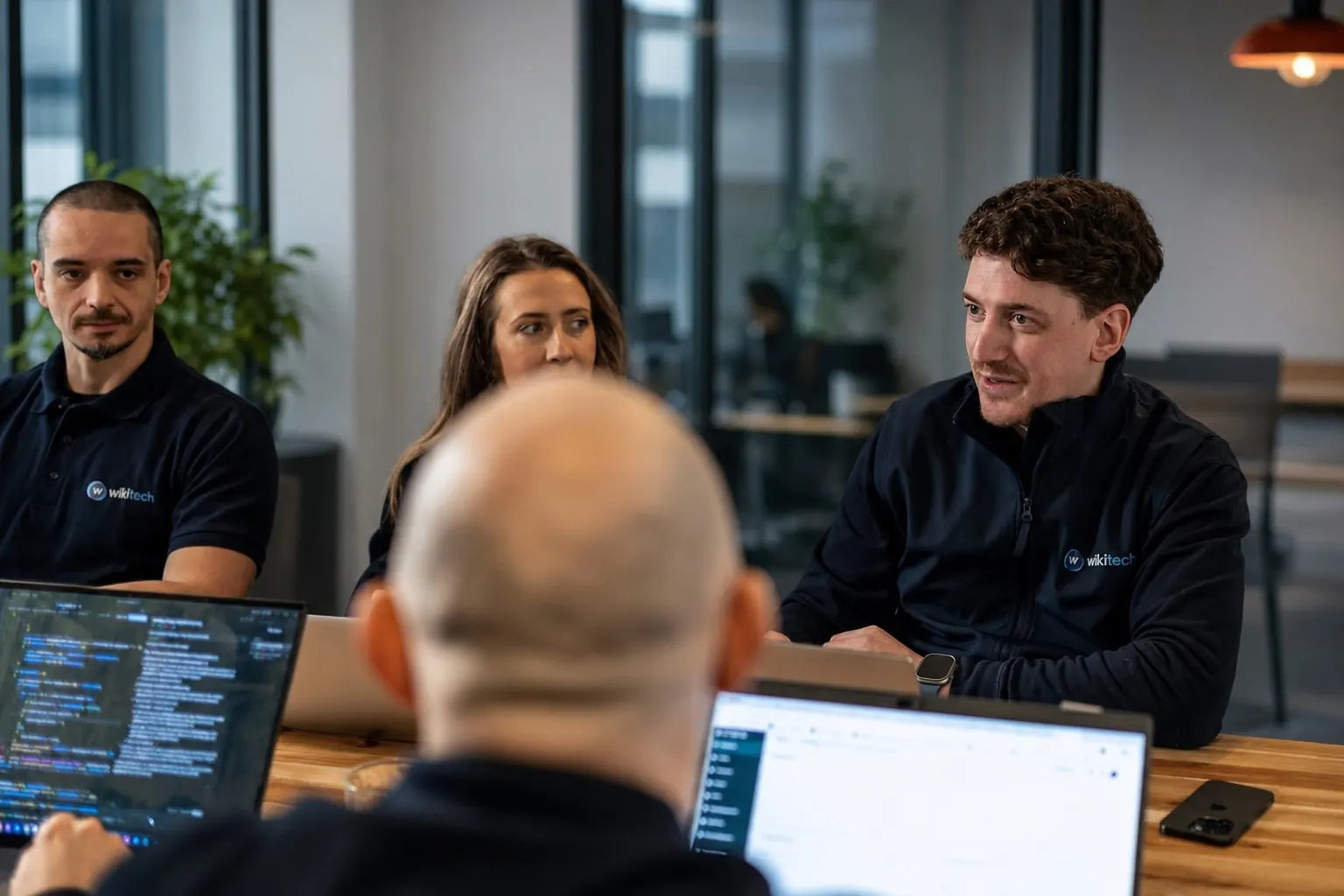 WikiTech team working together at the Maidstone office